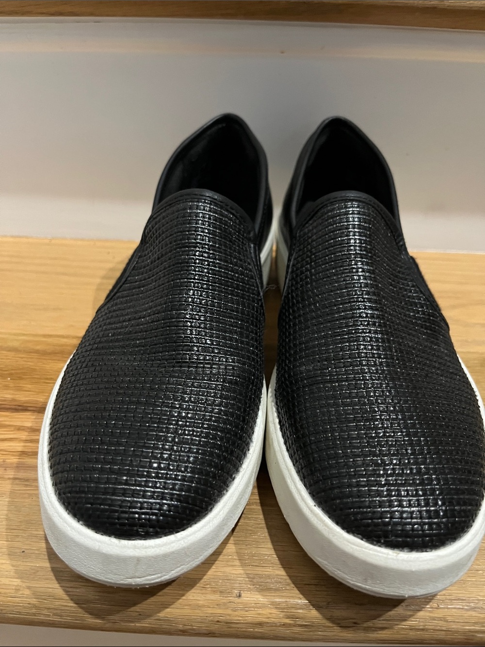 Clarks Black Textured Slip-On Sneakers with White Sole